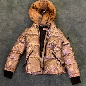 This is a kids Sam coat in the color silver and has a real fur trim. Size 12